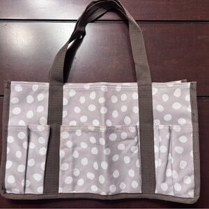 Thirty-One Polka Dot Tote with Brown Straps 13”L x 7”H x 6” D. Two mesh pockets.